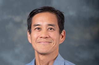 Penn Loh headshot